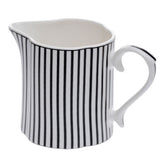 Jenna Clifford Creamer In Ivory Noir