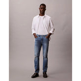 Calvin Klein Mens Slim Taper Medium Shower Jeans In Denim Blue