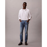 Calvin Klein Mens Slim Taper Medium Shower Jeans In Denim Blue