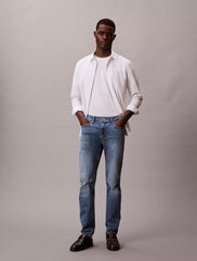 Calvin Klein Mens Slim Taper Medium Shower Jeans In Denim Blue