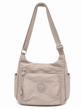 Free Spirit Multi Pocket Cross Body Bag In Sand