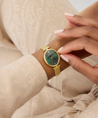 Guess Ladies Ruby Gold Tone Analog