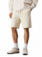 Calvin Klein Mens Garment Dye Shorts In Cream