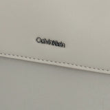 Calvin Klein Mens Sleek Reporter Mono Crossbody Bag In Light Brown