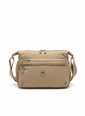 Free Spirit Medium Multi Pocket Sling Bag In Sand