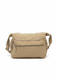 Free Spirit Medium Multi Pocket Sling Bag In Sand