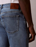Calvin Klein Mens Slim Taper Medium Shower Jeans In Denim Blue