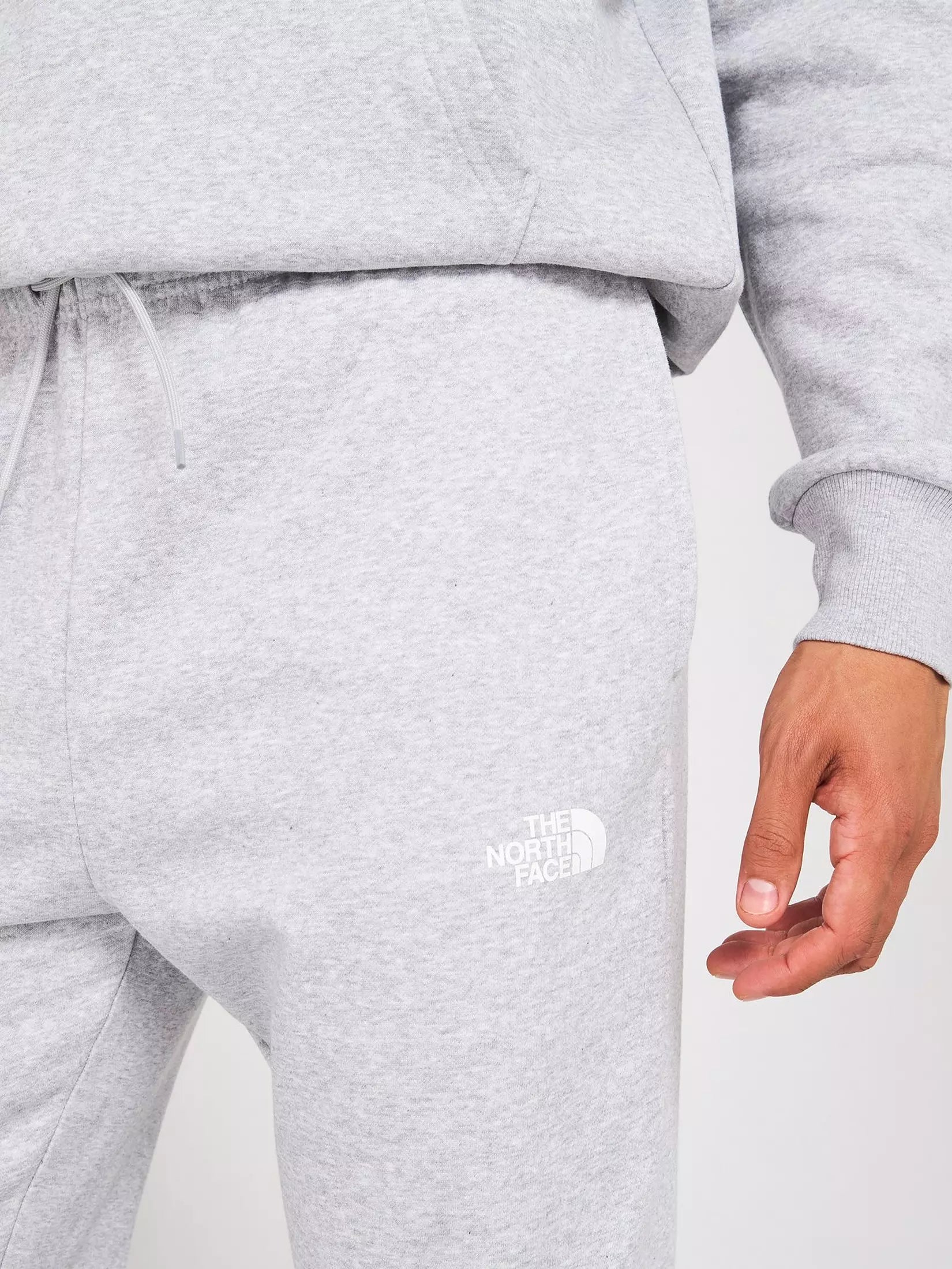 The North Face M Simpleregukar Tapered Jogger Light Grey