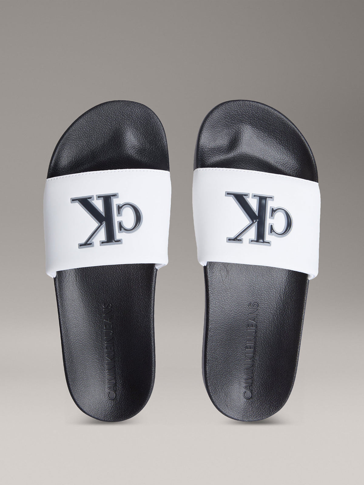 Calvin Klein Mens Jelly Mono Slides In Black and White