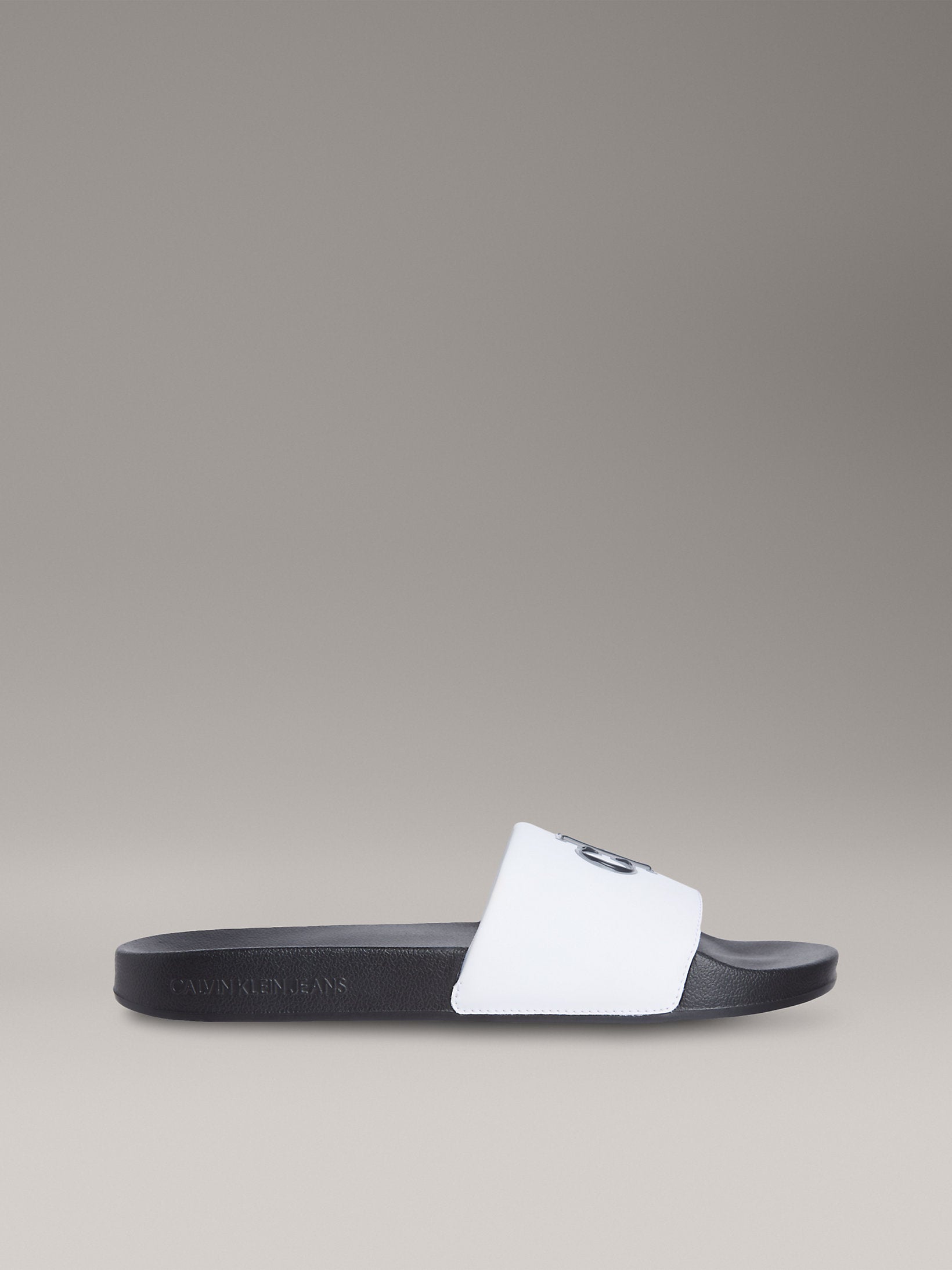 Calvin Klein Mens Jelly Mono Slides In Black and White
