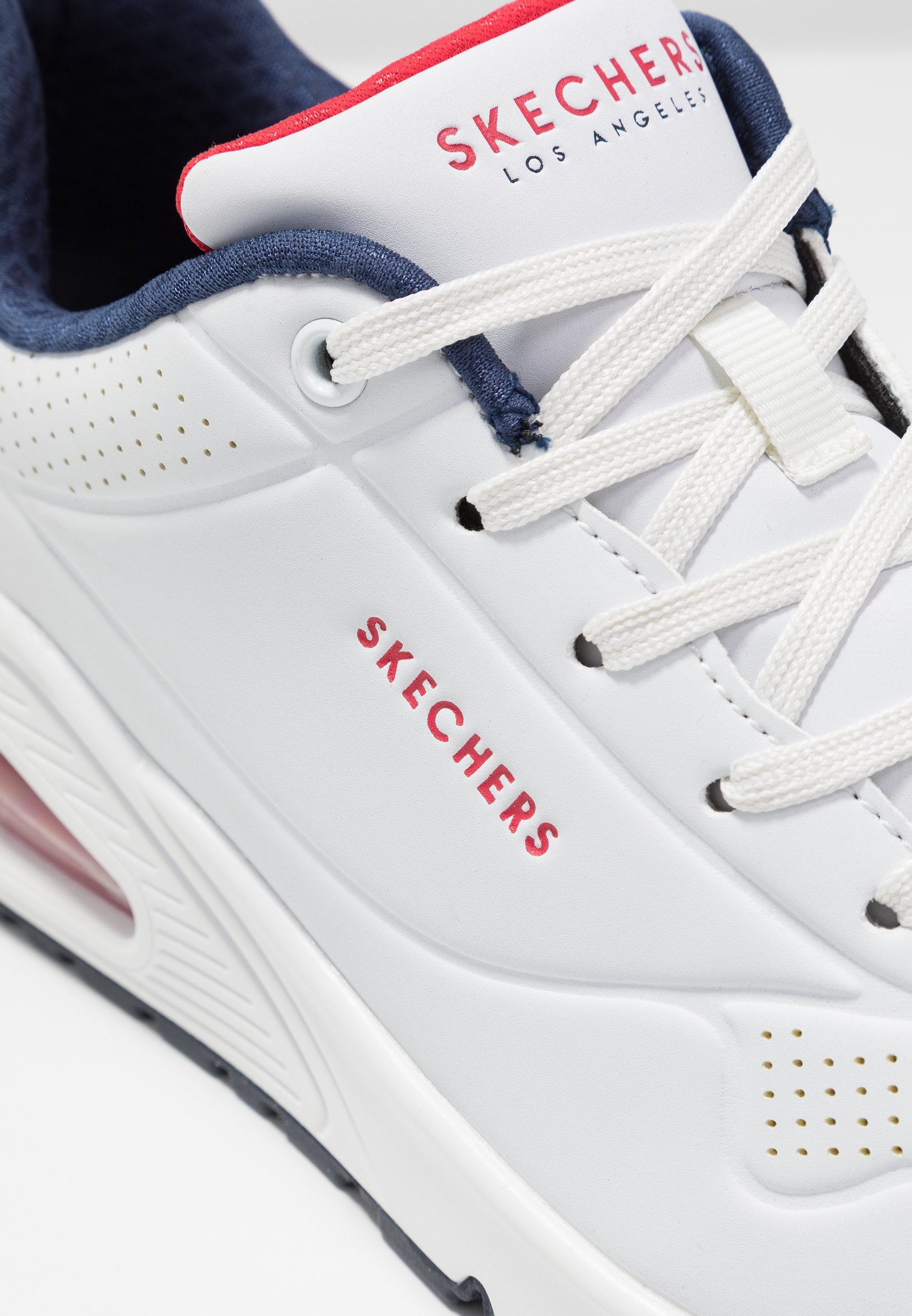 Skechers Womens Uno Stand On Air Shoes In White & Navy