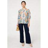 Stella Morgan Half Sleeve Batwing Easy Wearing Printed Sheer Blouse With Back Button Stand Detail In Blue Multi