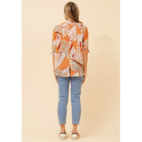 Izabel London Half Sleeve Batwing Printed Sheer Blouse Back Button In Orange