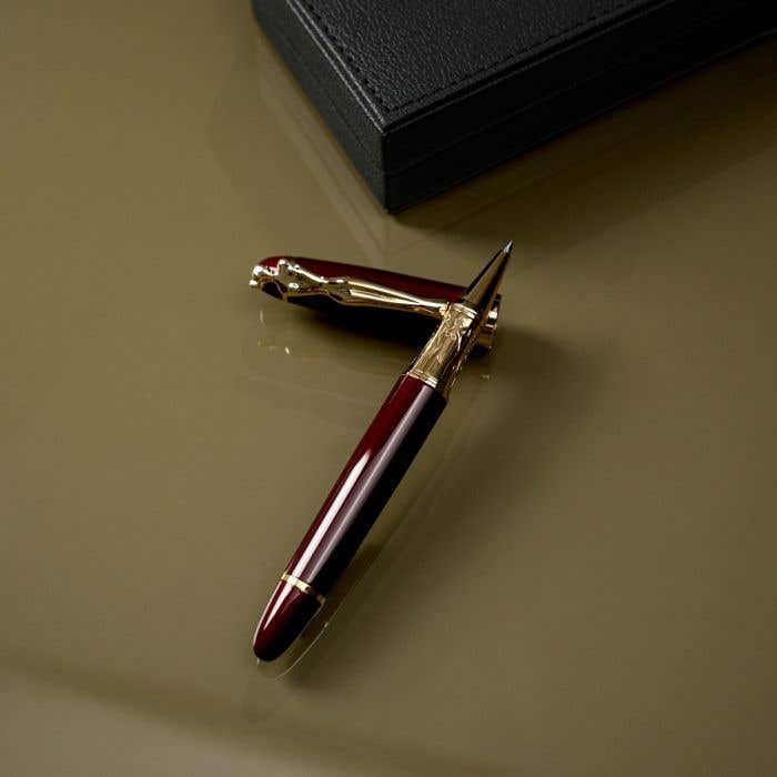 Carrol Boyes Rollerball Pen Woman In Gold/Burgandy