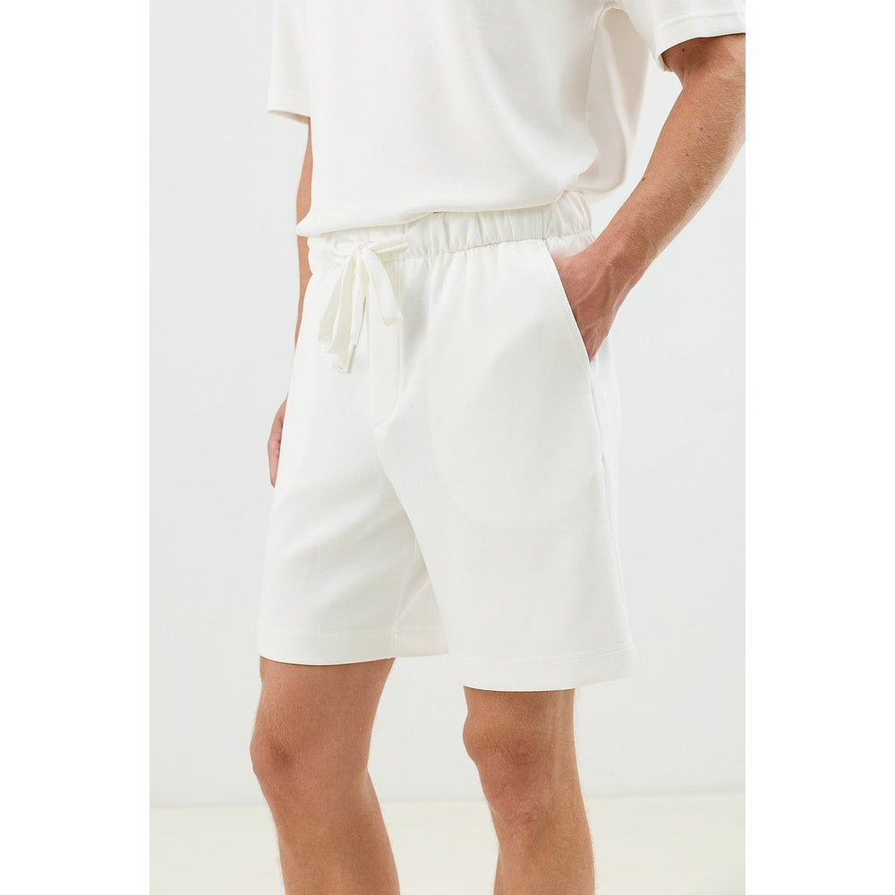 Antioch Mens Oussam Trousers In Ecru