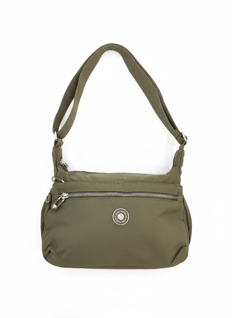 Free Spirit Medium Multi Pocket Sling Bag In Green