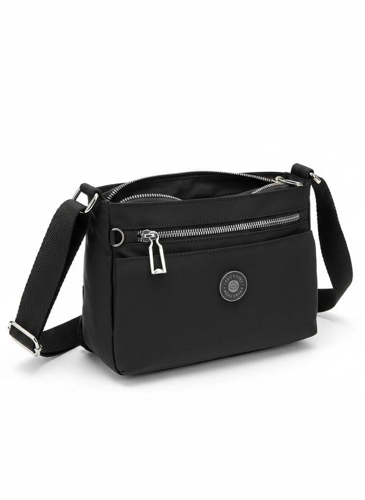 Free Spirit Medium Multi Pocket Sling Bag In Black