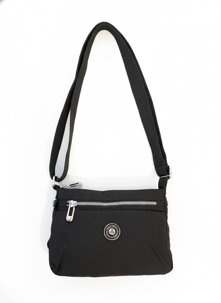 Free Spirit Medium Multi Pocket Sling Bag In Black